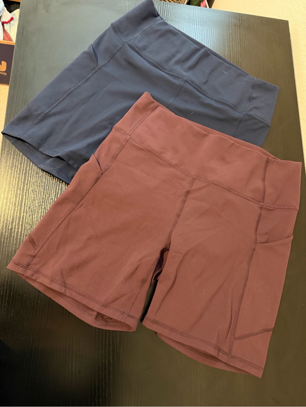 Two Fabletics High-Waist Bike Shorts in Navy and Burgundy